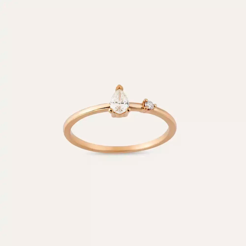 Deep 0.21 CT Pear Cut Diamond Rose Gold Ring