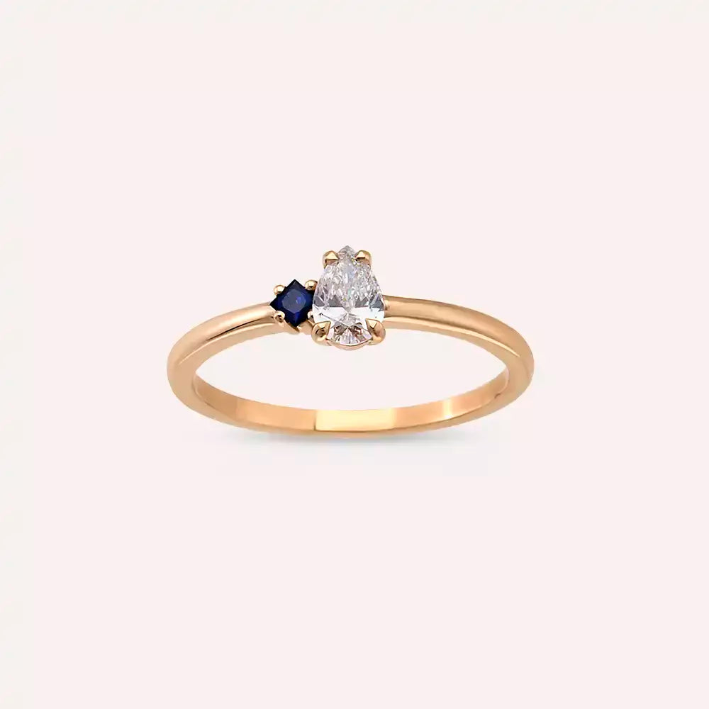 Deep 0.35 CT Pear Cut Diamond and Sapphire Rose Gold Ring