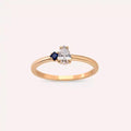 Deep 0.35 CT Pear Cut Diamond and Sapphire Rose Gold Ring