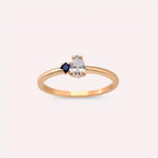 Deep 0.35 CT Pear Cut Diamond and Sapphire Rose Gold Ring