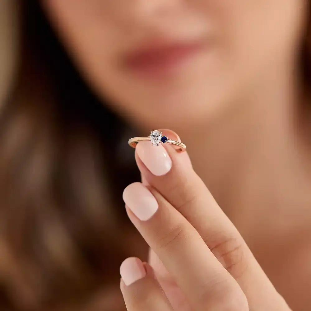 Deep 0.35 CT Pear Cut Diamond and Sapphire Rose Gold Ring
