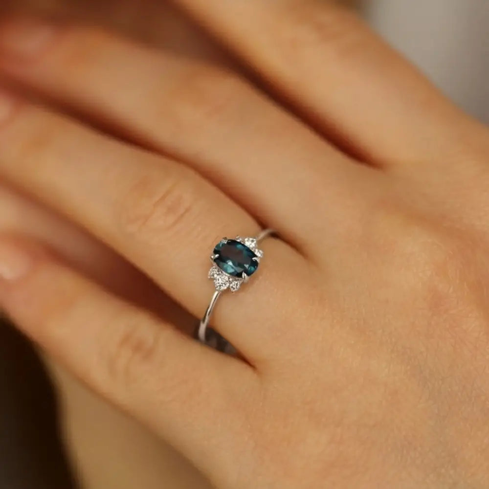 Navy 0.98 CT London Blue Topaz and Diamond White Gold Ring