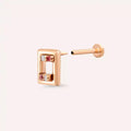 Rose Gold Piercing with Angled Diamonds and Red Sapphire Stones